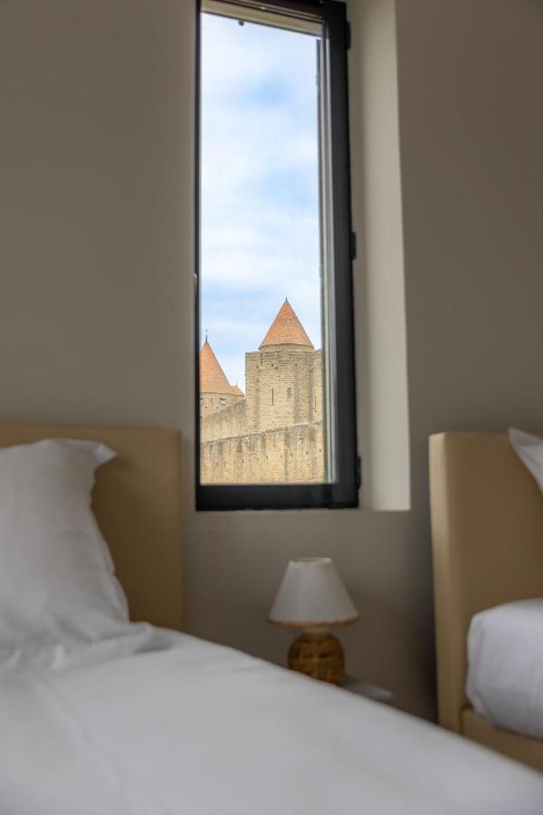 Sous Les Remparts La Maison Pimprenelle Carcassonne Exterior foto